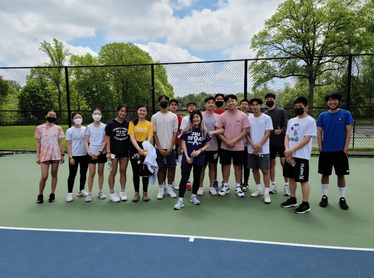 Large group of young volunteers outdoors